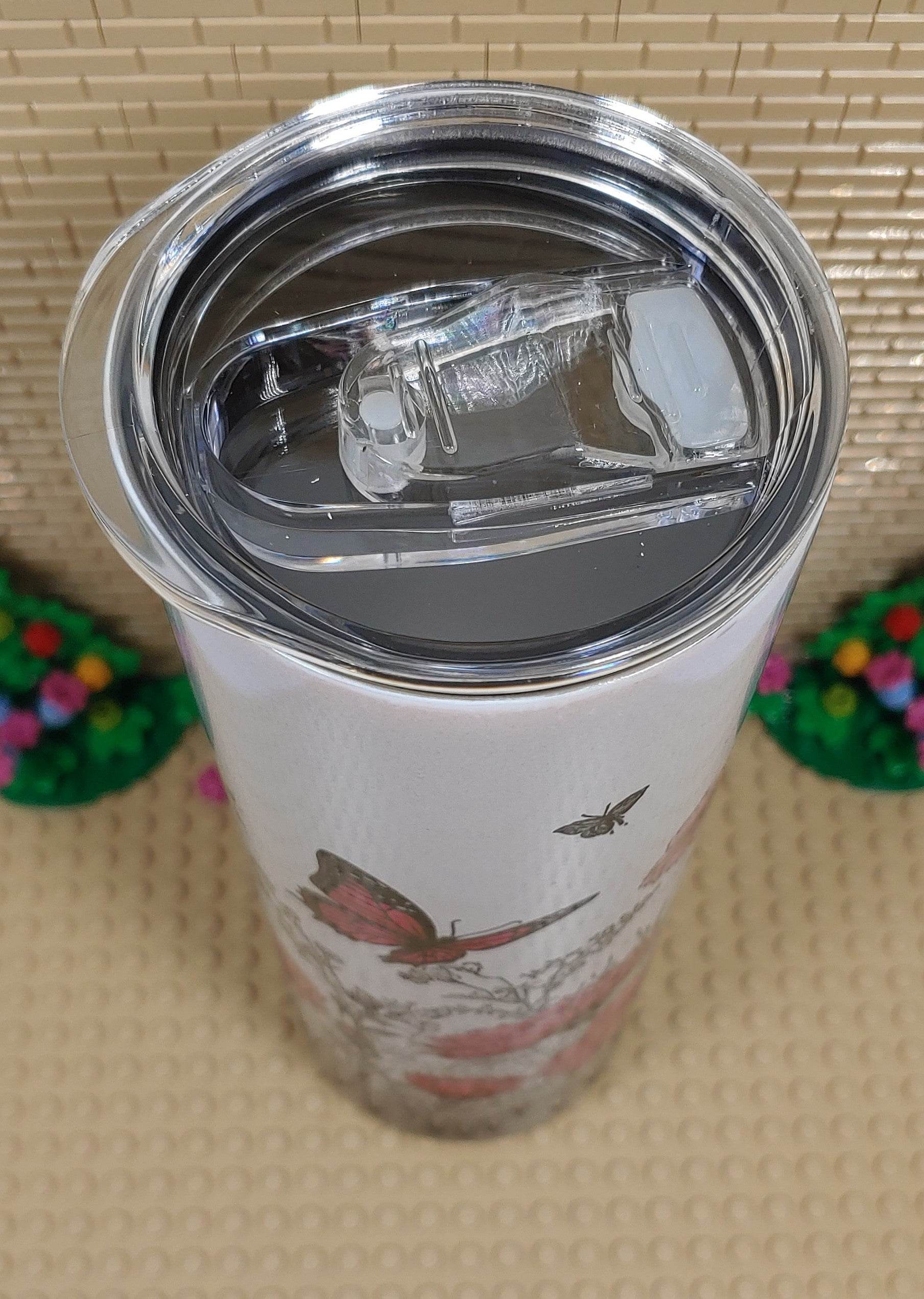 Butterflies and flowers Tumbler