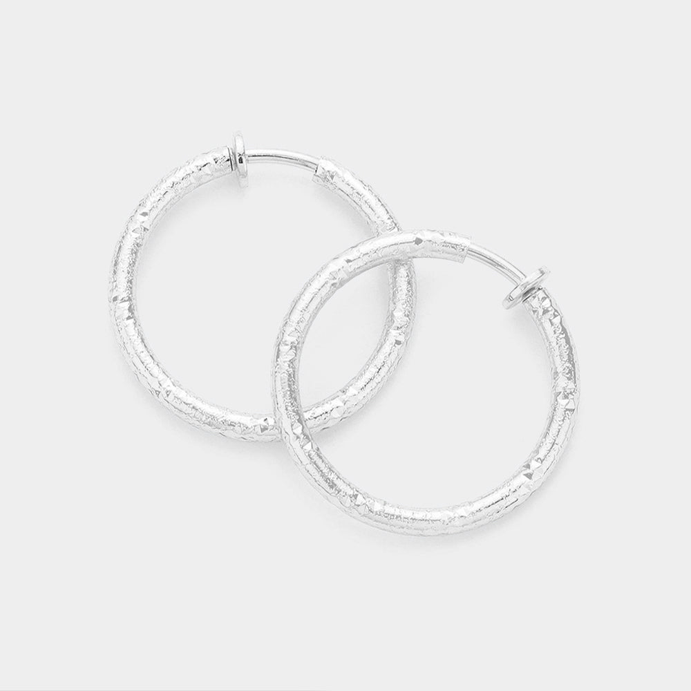 1.25 Inch Textured Metal Hoop Clip On Earrings