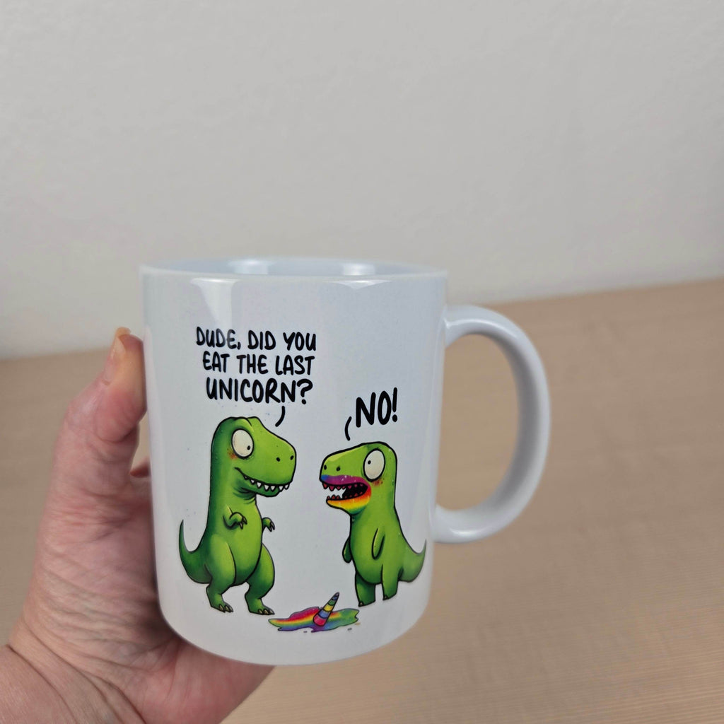 Funny Dinosaurs eating a Unicorn Mug