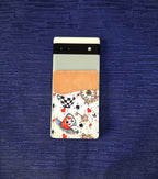 Alice Inspired Adhesive Cell Phone Wallet (Multiple designs available)